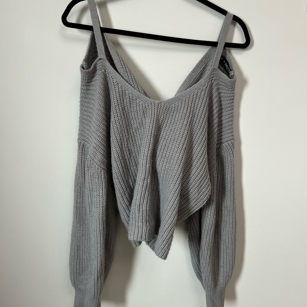 Cropped sweater with criss cross at the back